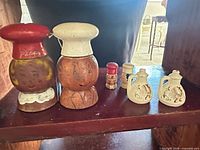 all six shakers on shelf