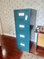 Front view showing all four drawers, color and style