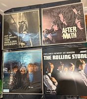 Front jackets of the four Rolling Stones albums