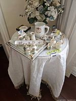 Top view of side table showing glass surface and surrounding items (contents not included)