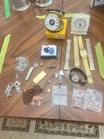 Group view of watches, clocks, jewelry and accessories