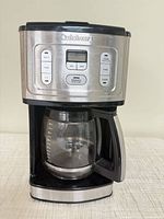 Front view of Cuisinart coffee maker showing control panel and carafe in place