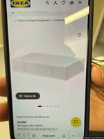 Phone displaying IKEA SKUBB product page