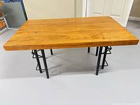 Top view of honey-tone solid wood coffee table, full table visible