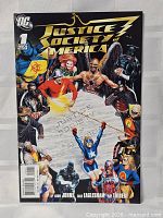 Front cover showing title, publisher logo, issue number, creative team credits