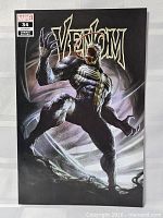Front cover of Venom #34 variant comic displaying artwork and issue details