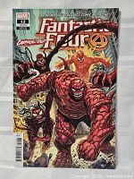 Front cover showing Carnage-ized variant artwork, issue number 12B, Marvel variant edition banner