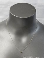 Necklace displayed on bust showing overall appearance