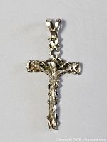 front view of sterling silver crucifix pendant