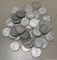 Pile of assorted 1950s Canadian 10-cent coins