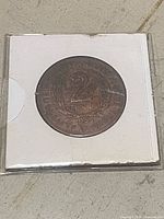 Reverse side showing denomination 2 Cents, wreath, date 1955