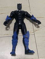 Front view of Black Panther Mech Strike 6-inch action figure showing color scheme and articulation points