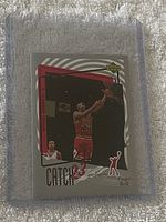 Front of Michael Jordan Upper Deck Catch 23 card in sleeve