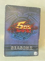 Front of Yu-Gi-Oh! 5D's Season 2 DVD slipcase showing logo and 3-DVD marking