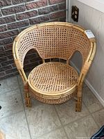 Front view of bamboo and cane armchair