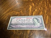 Full view of 1954 Canadian $10 note in sleeve