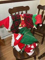 Stack of hats and stockings on chair