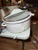 Angled view illustrating overall condition and side handles