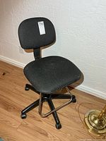 Full view of chair showing seat, backrest and footrest