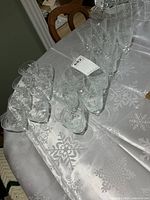All twenty pinwheel crystal stemware pieces arranged on table