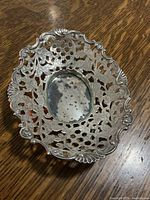 Top view showing pierced floral border and overall design