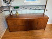 Front angled view showing drawers and cabinet door