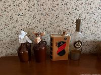 Group shot of all four decanters on tabletop