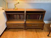 Front view of both Malcolm side tables showing shelves, drawers and condition