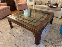 Full view of square Drexel Heritage coffee table with glass top