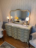 Full view of dresser, mirror, and glass top
