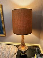 Full view of lamp with shade and base