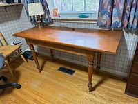 Full view of pine harvest table in room