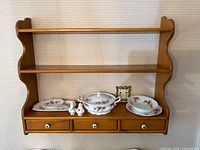 Front view showing full shelf structure and drawers