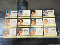 All 12 cards laid out in three rows of four
