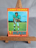 Front view of Larry Csonka 1971 Topps card on stand