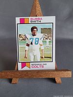 Full front view of Bubba Smith 1973 Topps card on easel