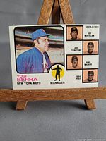 Front view of the 1973 Topps Yogi Berra manager card on stand