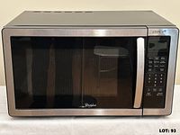 Front view showing Whirlpool logo, door, control panel