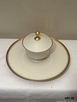 Top view of cake stand with covered candy dish