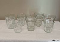 Group shot of all 19 clear glass tumblers of varying sizes