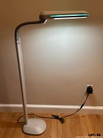 Full view of Ott-Lite floor task lamp lit