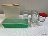 All items: cereal container, celery container, stacked tumblers, red lid