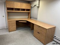 L-shaped desk system showing hutch, pedestal, return with lateral file