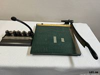 Paper cutter and 5-hole punch side by side