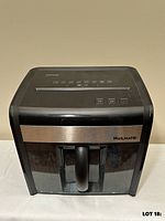 Front view of Staples Mailmate shredder showing overall design