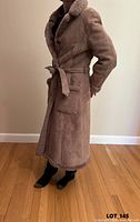 Front view worn showing fit, buttons, belt, pockets