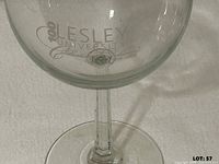 Close-up of etching on one glass showing commemorative text