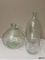 All three glass bottles grouped