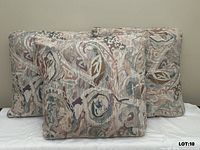 Three pillows front view showing matching pattern and condition