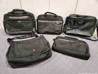 Front view showing all five laptop bags